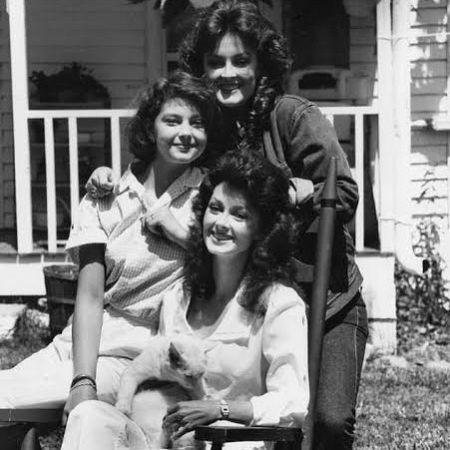 Grace Pauline Kelley's mother and grandmother took a picture in front of their house.